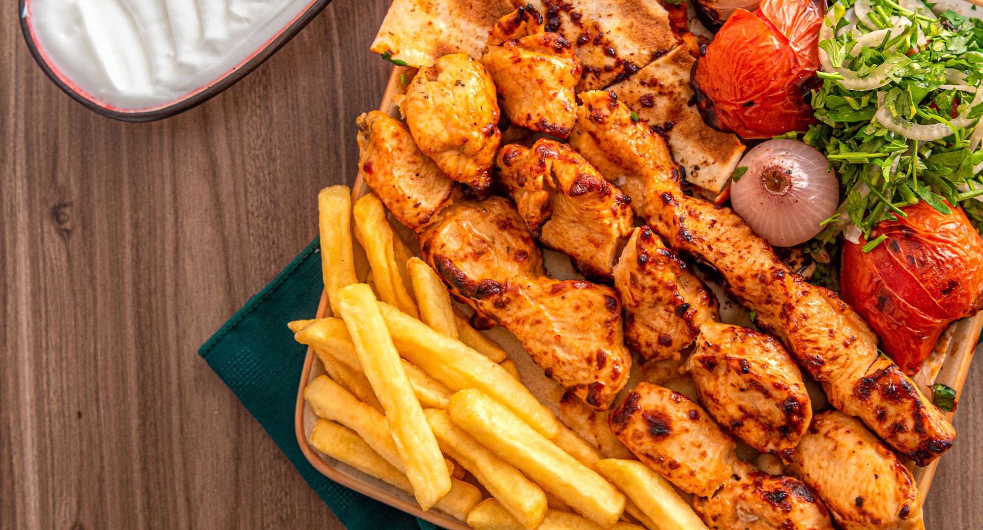 Signature Chicken Tikka Dishes at Al Mashawi Al Halabya